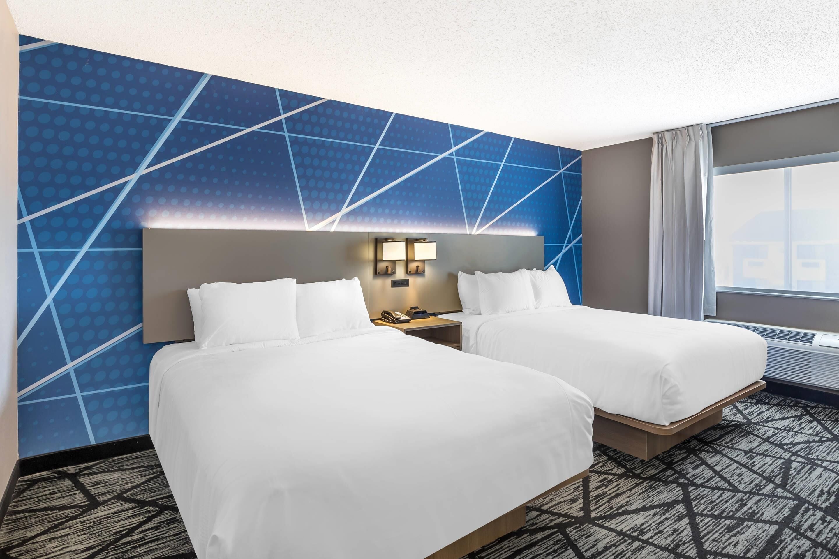 Standard Room, 2 Queen Beds, Non Smoking | Premium bedding, down duvets, desk, blackout curtains