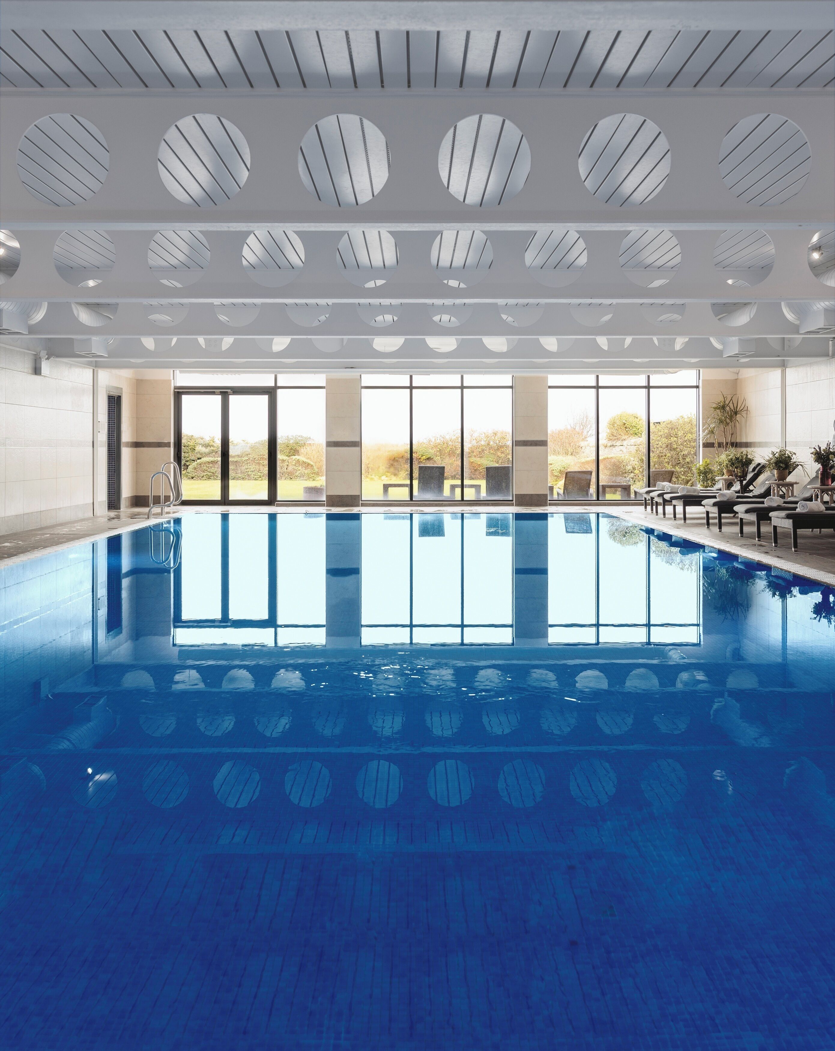 indoor pool, pool loungers