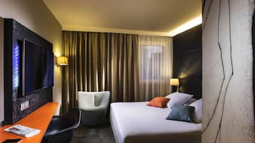 Ropa de cama de alta calidad, minibar, caja fuerte y escritorio