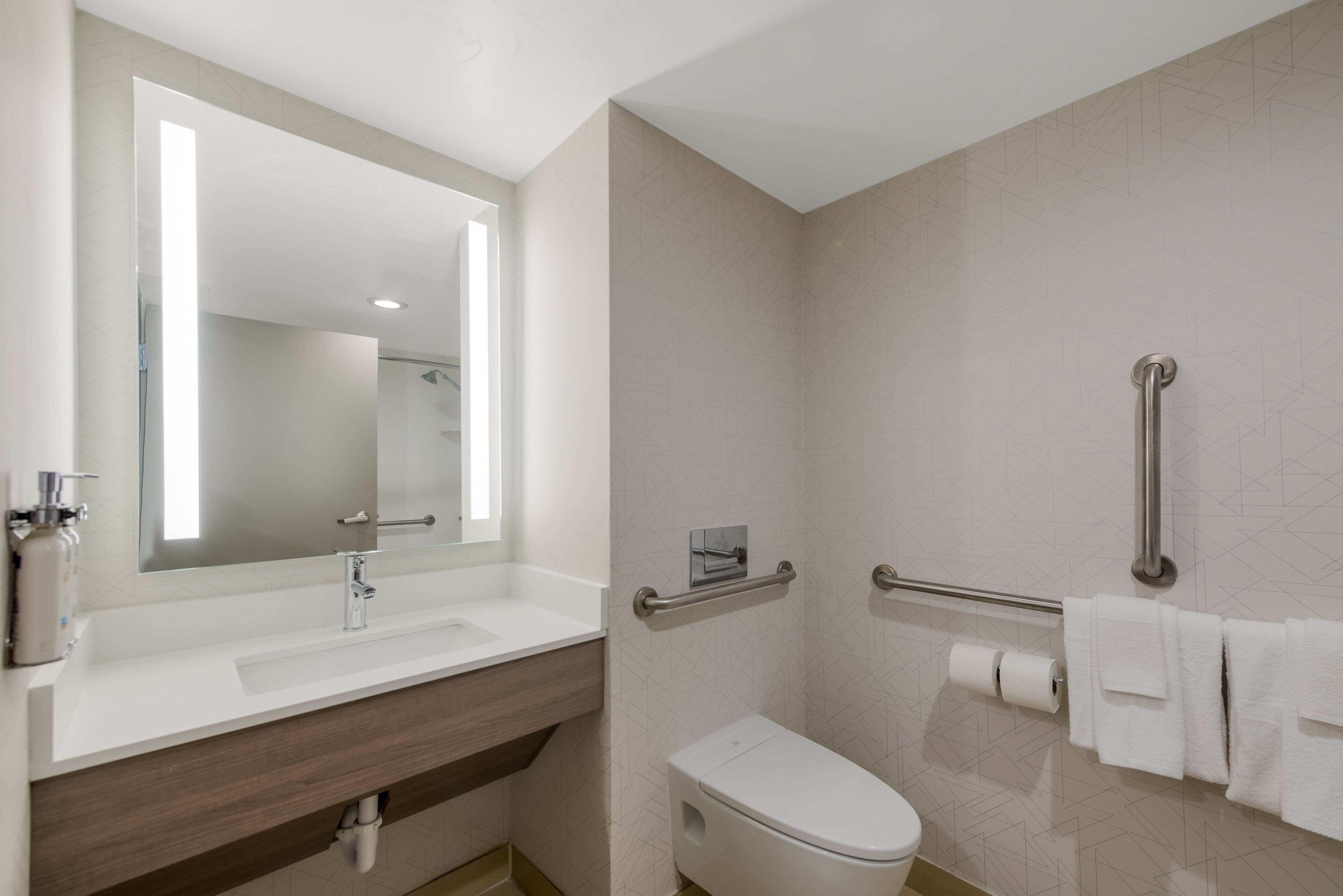 suite, 1 king bed, accessible | bathroom | hair dryer, towels, soap, shampoo