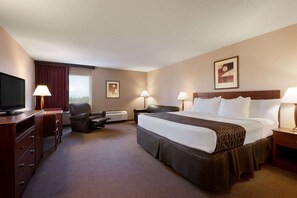 Suite, 1 King Bed, Non Smoking | Premium bedding, in-room safe, blackout drapes, iron/ironing board