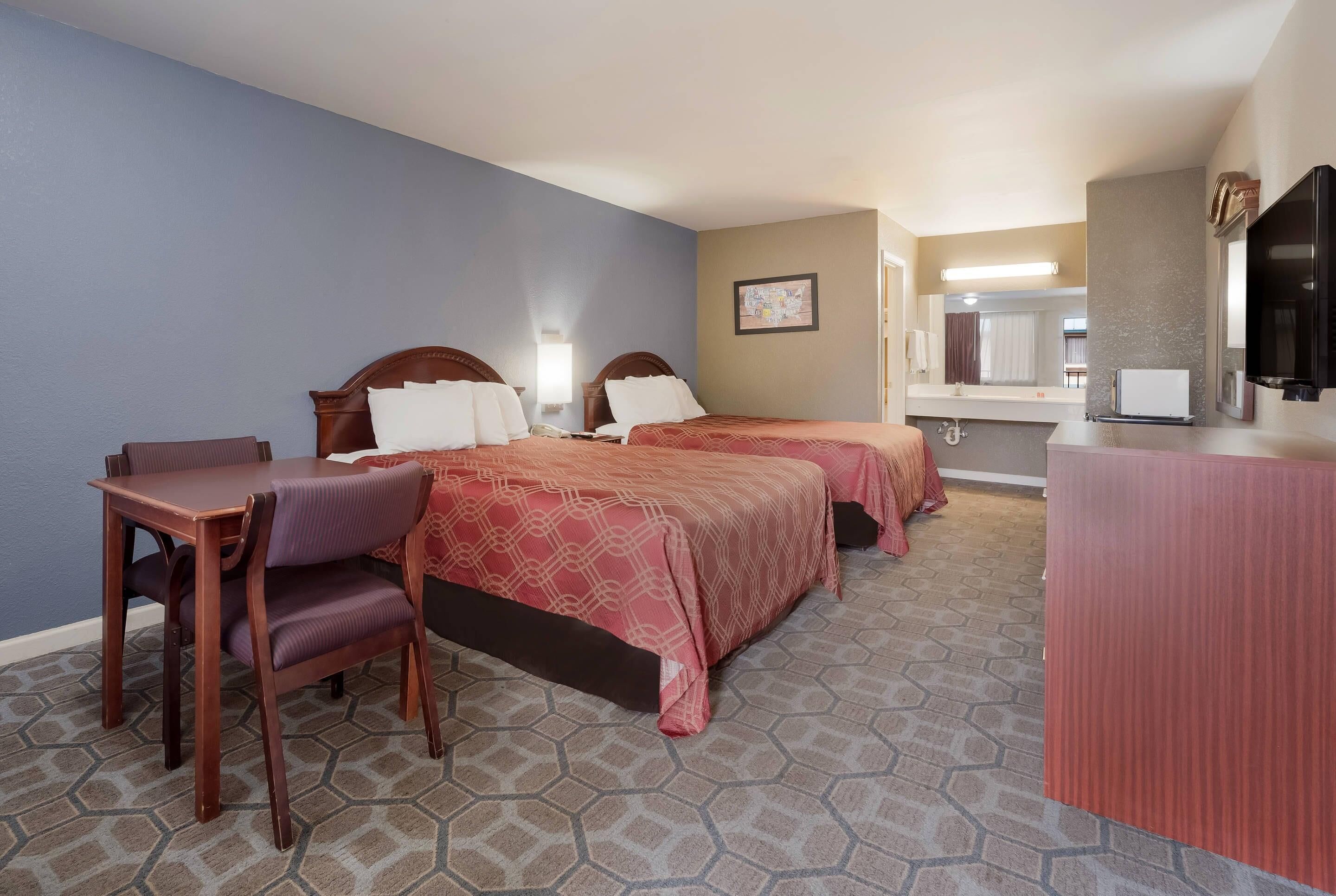 Standard Room, 2 Queen Beds, Smoking | Desk, iron/ironing board, cribs (surcharge), rollaway beds (surcharge)