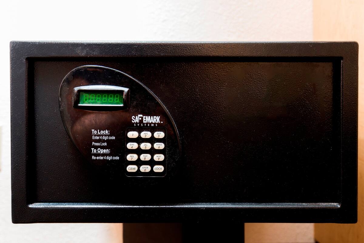 A digital keypad with instructions for locking and unlocking a door.