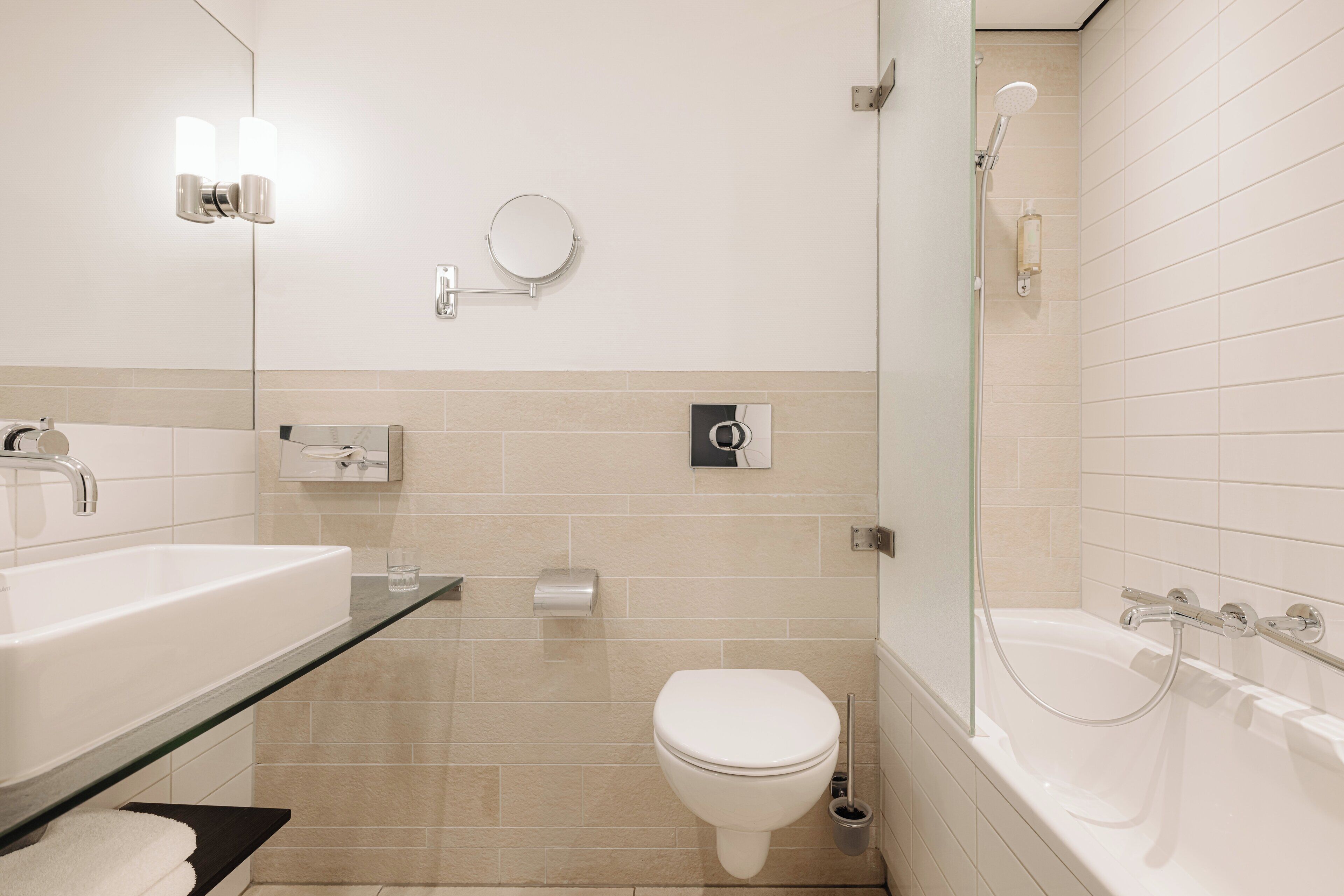 combined shower/bathtub, free toiletries, hair dryer, bathrobes