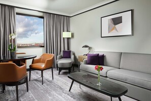 Executive Suite, 1 King Bed | Living area | 55-inch flat-screen TV with digital channels, toys - Hilton Prague Atrium (Prague)