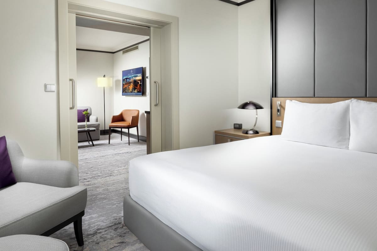 Junior Suite, 1 King Bed | Living area | 55-inch flat-screen TV with digital channels, toys