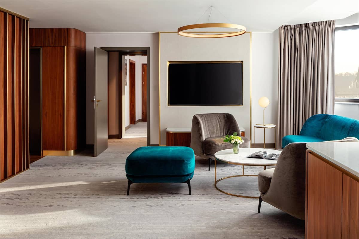 Royal Suite, 1 King Bed | Living area | 55-inch flat-screen TV with digital channels, toys