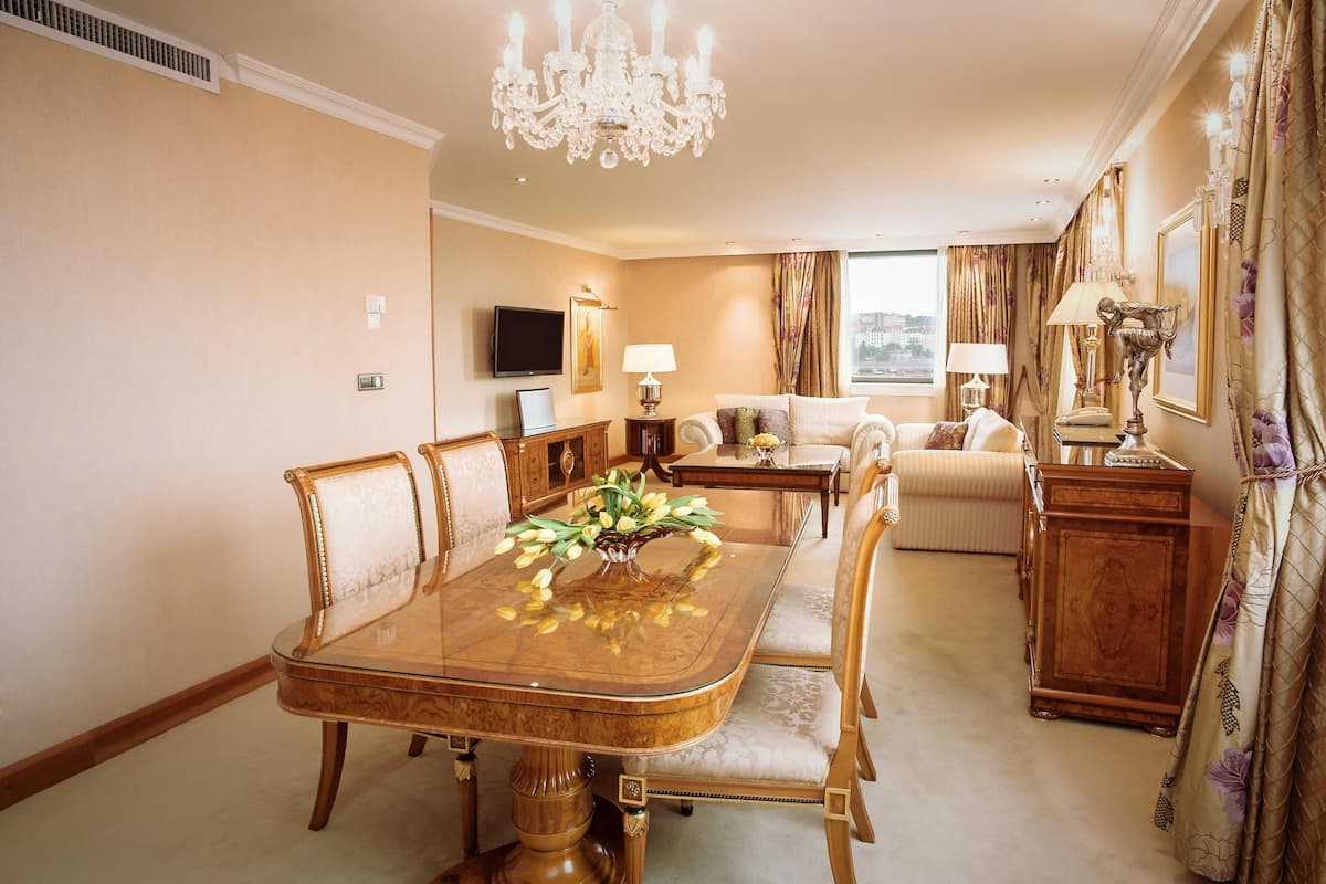 Presidential Suite, 1 King Bed | Living area | 55-inch flat-screen TV with digital channels, toys