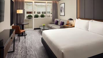 Family Room, 1 King Bed (Executive) | Living area | 55-inch flat-screen TV with digital channels, toys