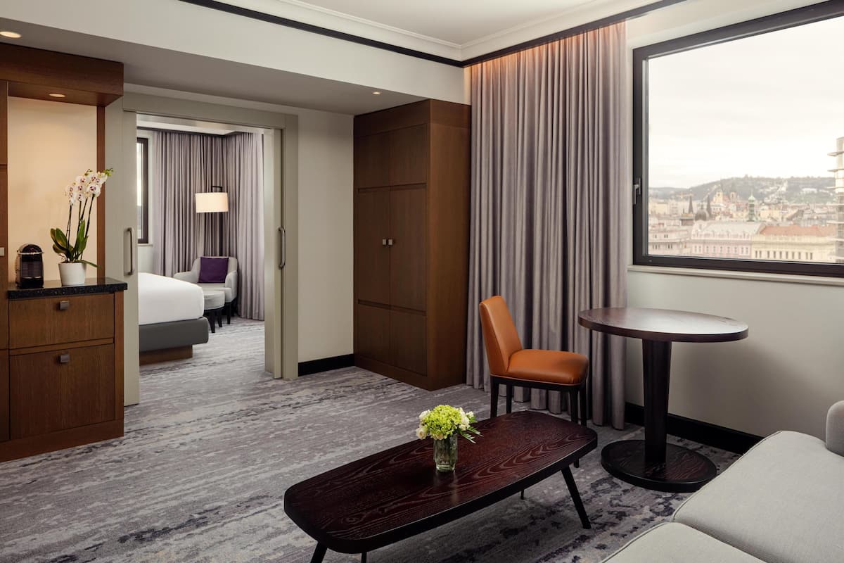 Junior Suite, 1 King Bed | Living area | 55-inch flat-screen TV with digital channels, toys