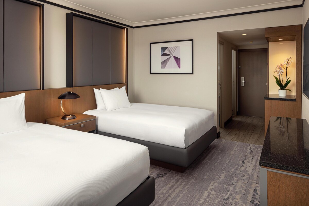 In-room safe, laptop workspace, blackout drapes, soundproofing