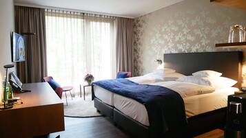 Executive-huone, 1 parisänky, lisärakennuksessa (Cozy Sitting Corner) | Ylelliset vuodevaatteet, untuvapeitot, minibaari, tallelokero huoneessa