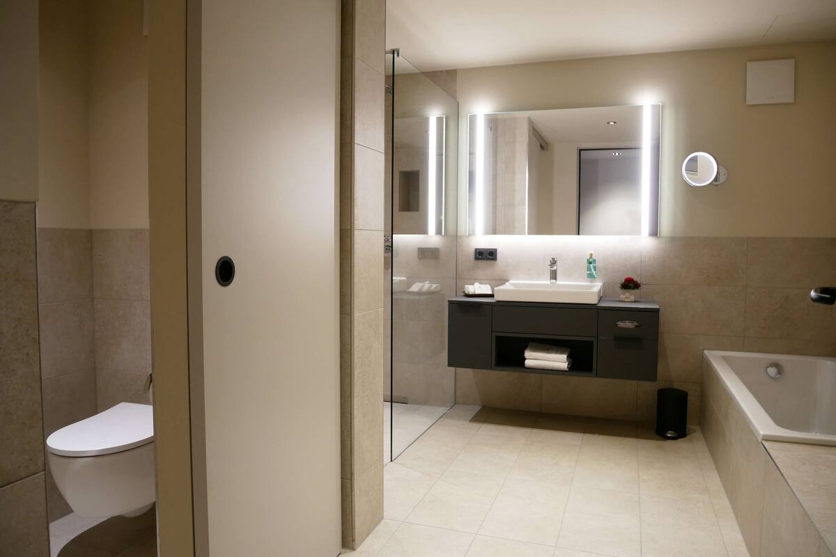 superior room, 1 king bed, annex building | bathroom | hair dryer, bathrobes, towels