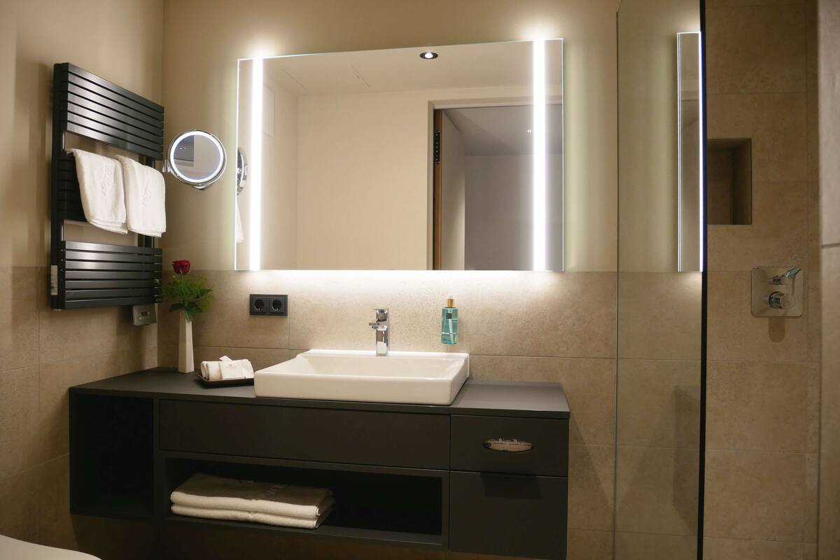 hair dryer, bathrobes, towels