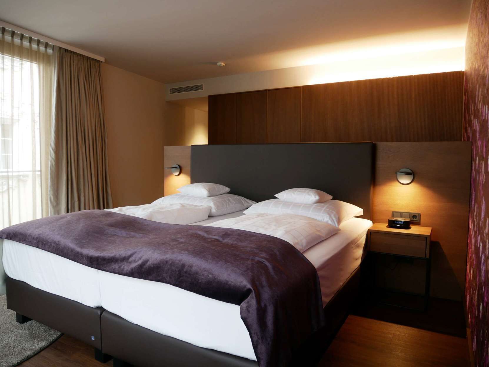 Premium bedding, down duvets, in-room safe, individually decorated
