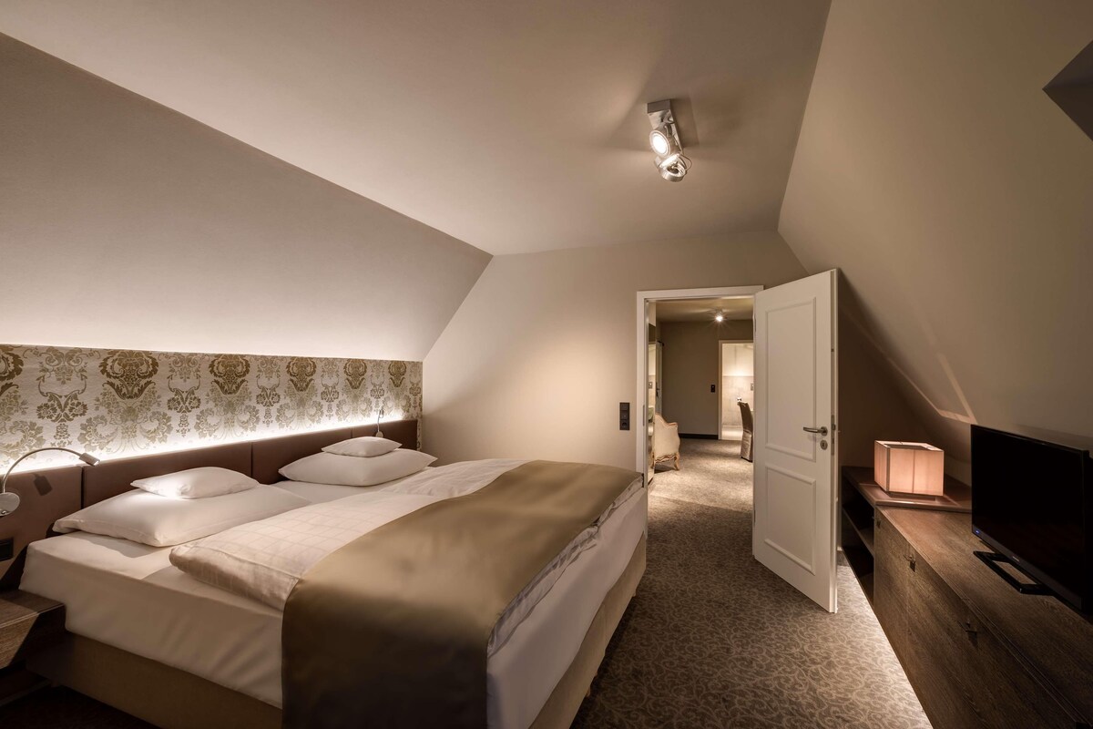 Premium bedding, down duvets, in-room safe, desk