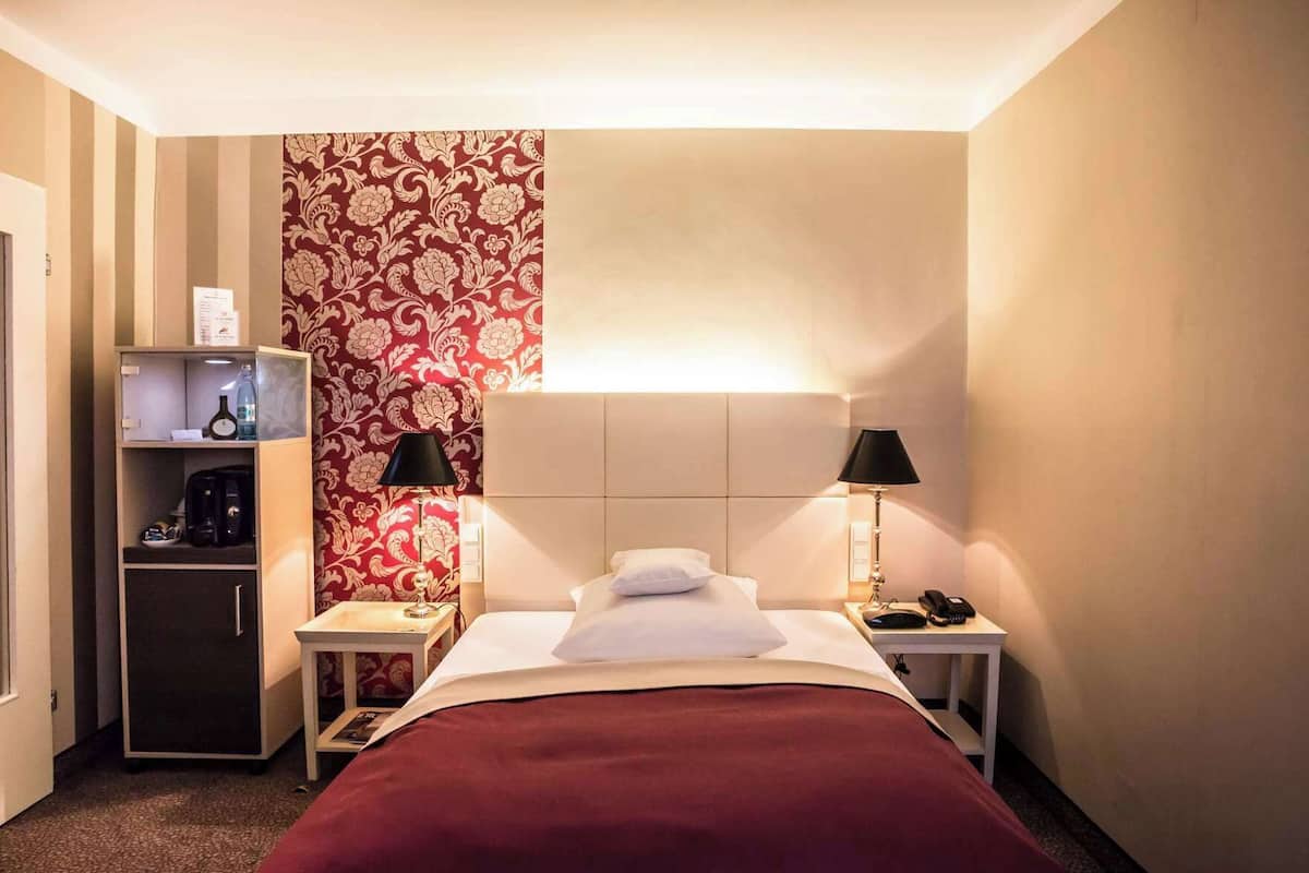 Premium bedding, down duvets, in-room safe, desk