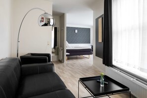 Suite, 1 King Bed, Non Smoking, Bathtub | Premium bedding, desk, laptop workspace, blackout drapes