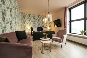 Premium bedding, desk, laptop workspace, blackout curtains