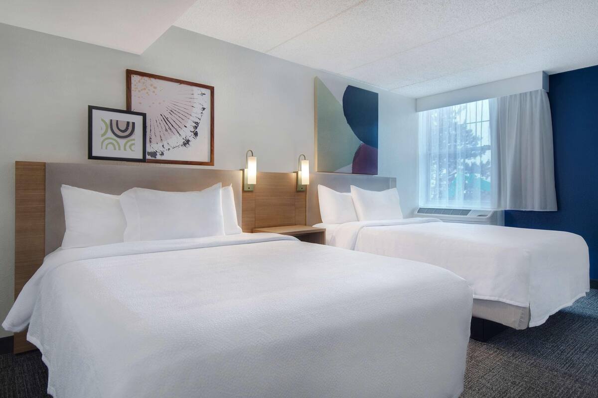 Hypo-allergenic bedding available, desk, laptop workspace