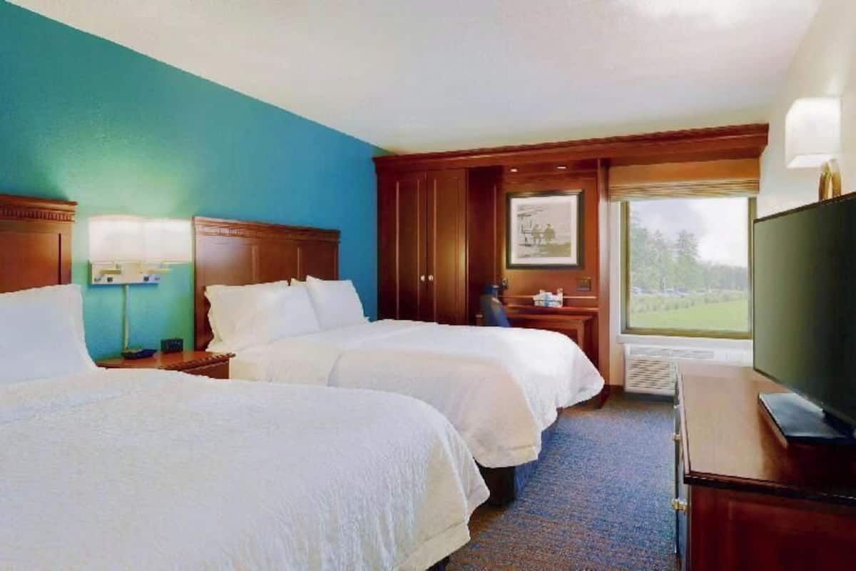 Premium bedding, desk, blackout drapes, iron/ironing board