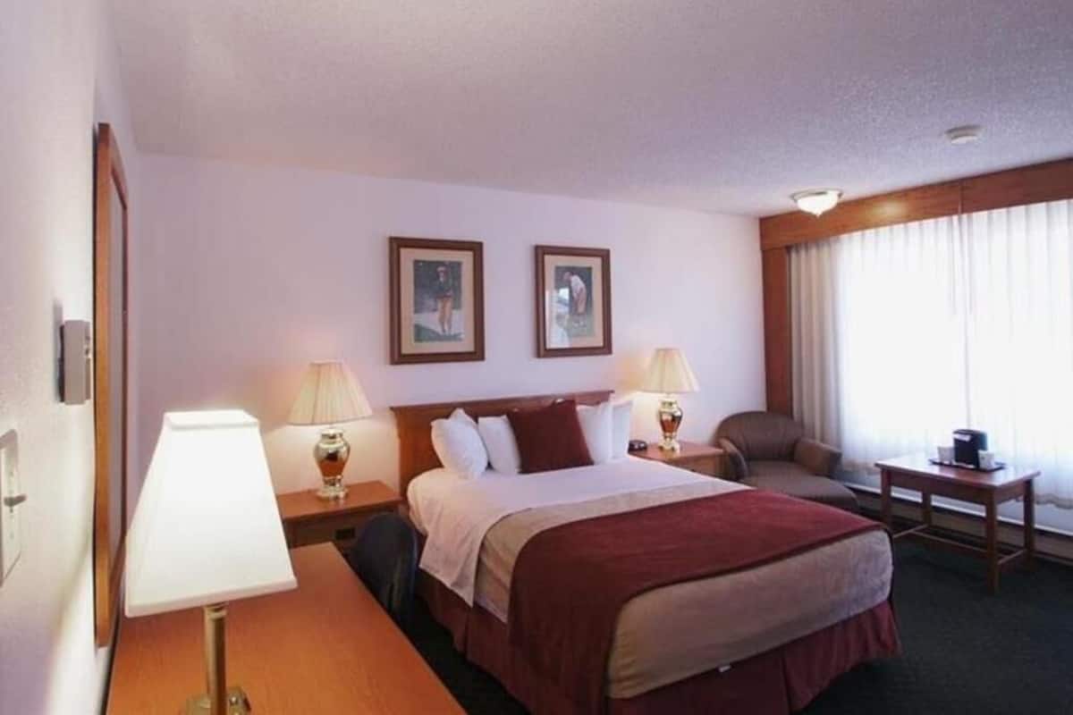 Blackout drapes, iron/ironing board, free WiFi, bed sheets