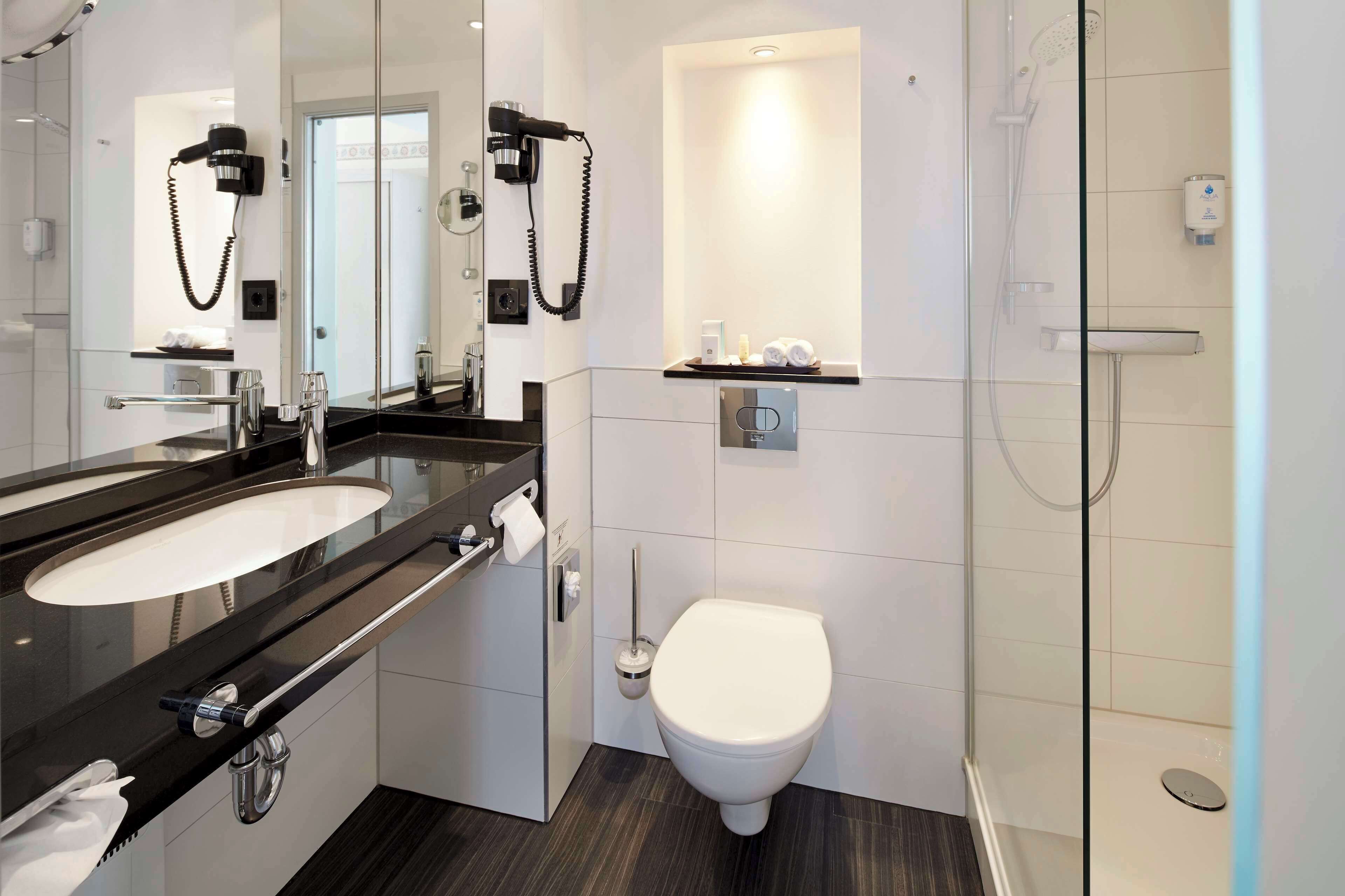 shower, free toiletries, hair dryer, towels