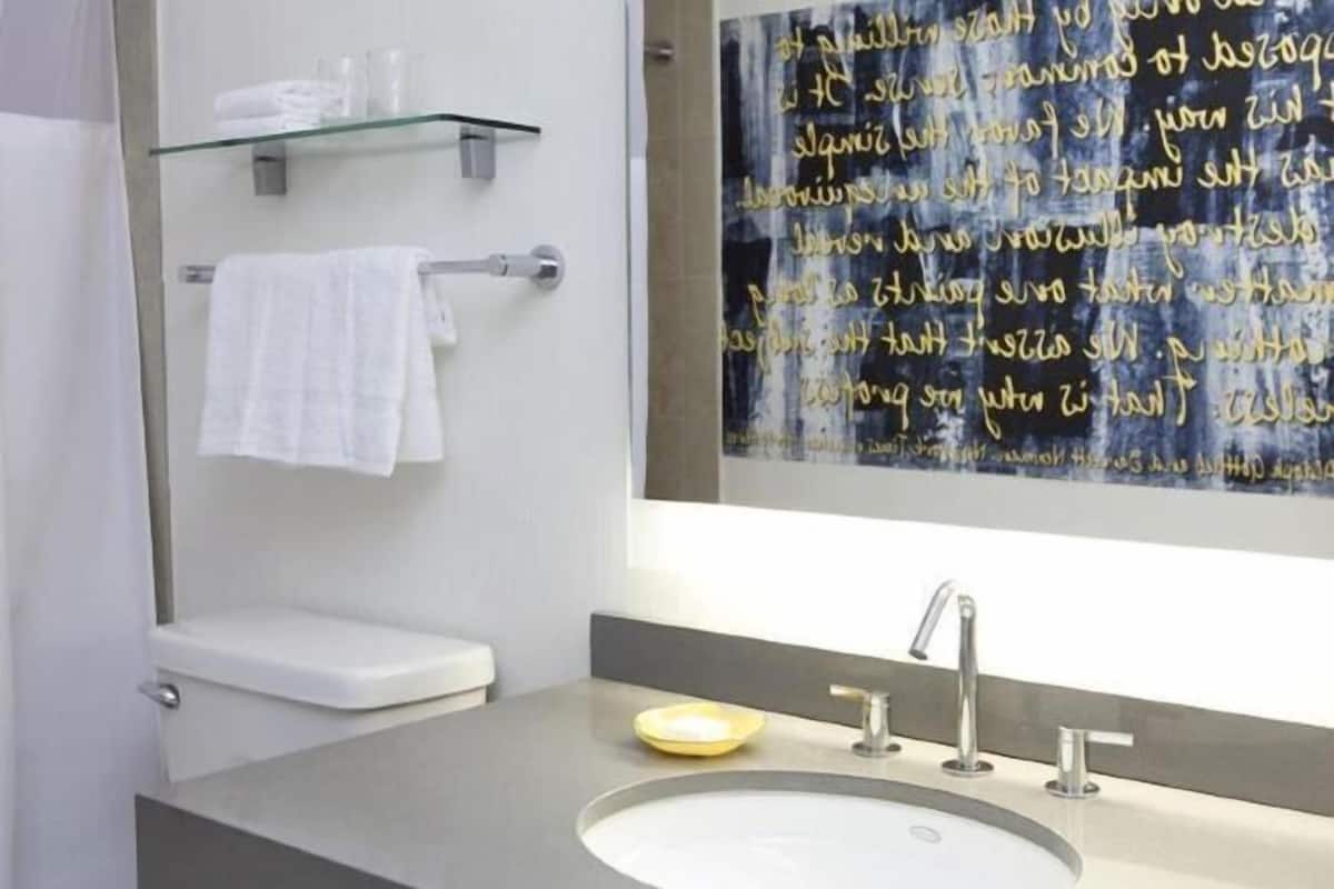 Bathroom | Shower, designer toiletries, hair dryer, towels