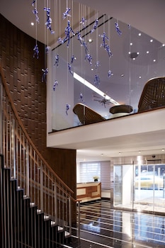 Hotel entrance and lobby at The Fifty Sonesta Hotel New York