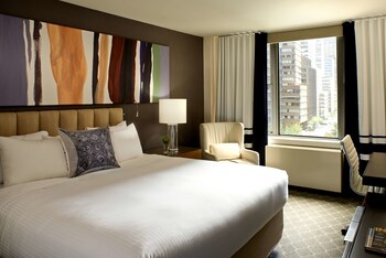 Egyptian cotton sheets, premium bedding, in-room safe, desk at The Fifty Sonesta Hotel New York