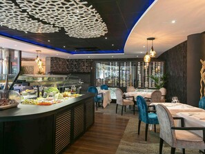 Breakfast, lunch, dinner served; French cuisine, pool views