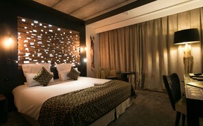 Hypo-allergenic bedding, minibar, in-room safe, desk