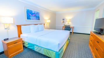 Premium bedding, desk, laptop workspace, blackout curtains