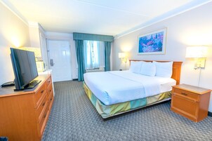 Premium bedding, desk, laptop workspace, blackout curtains