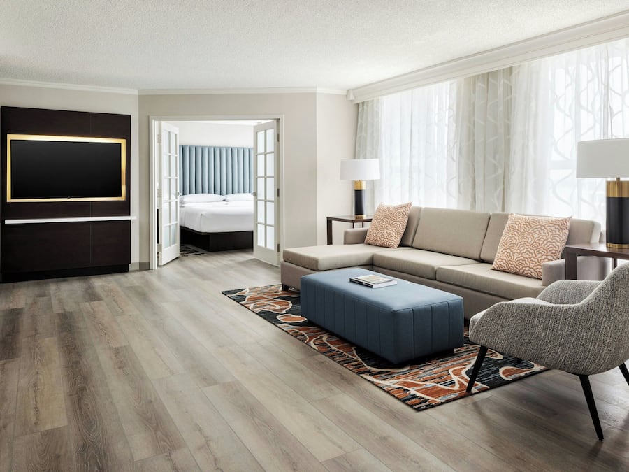 Luxury Suite, 1 Bedroom | 1 bedroom, hypo-allergenic bedding, desk, blackout drapes