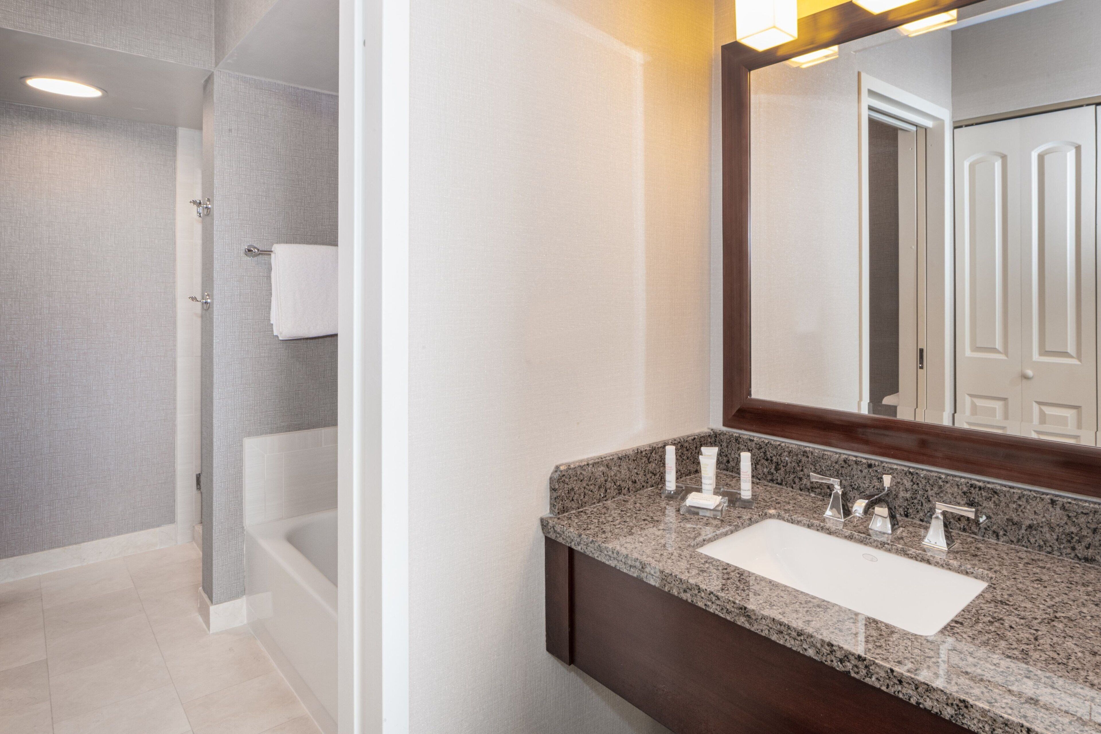 separate bathtub and shower, free toiletries, hair dryer, towels