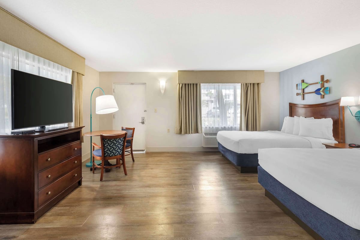 Pillowtop beds, desk, laptop workspace, blackout drapes