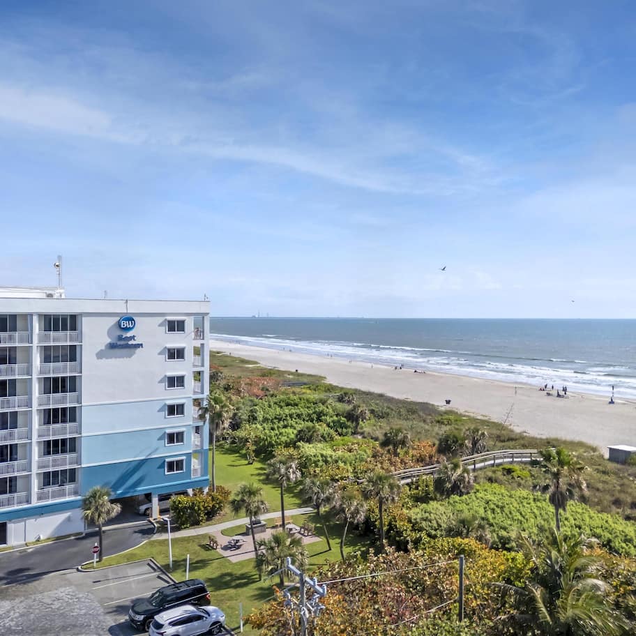 A hotel with a view of the beach.