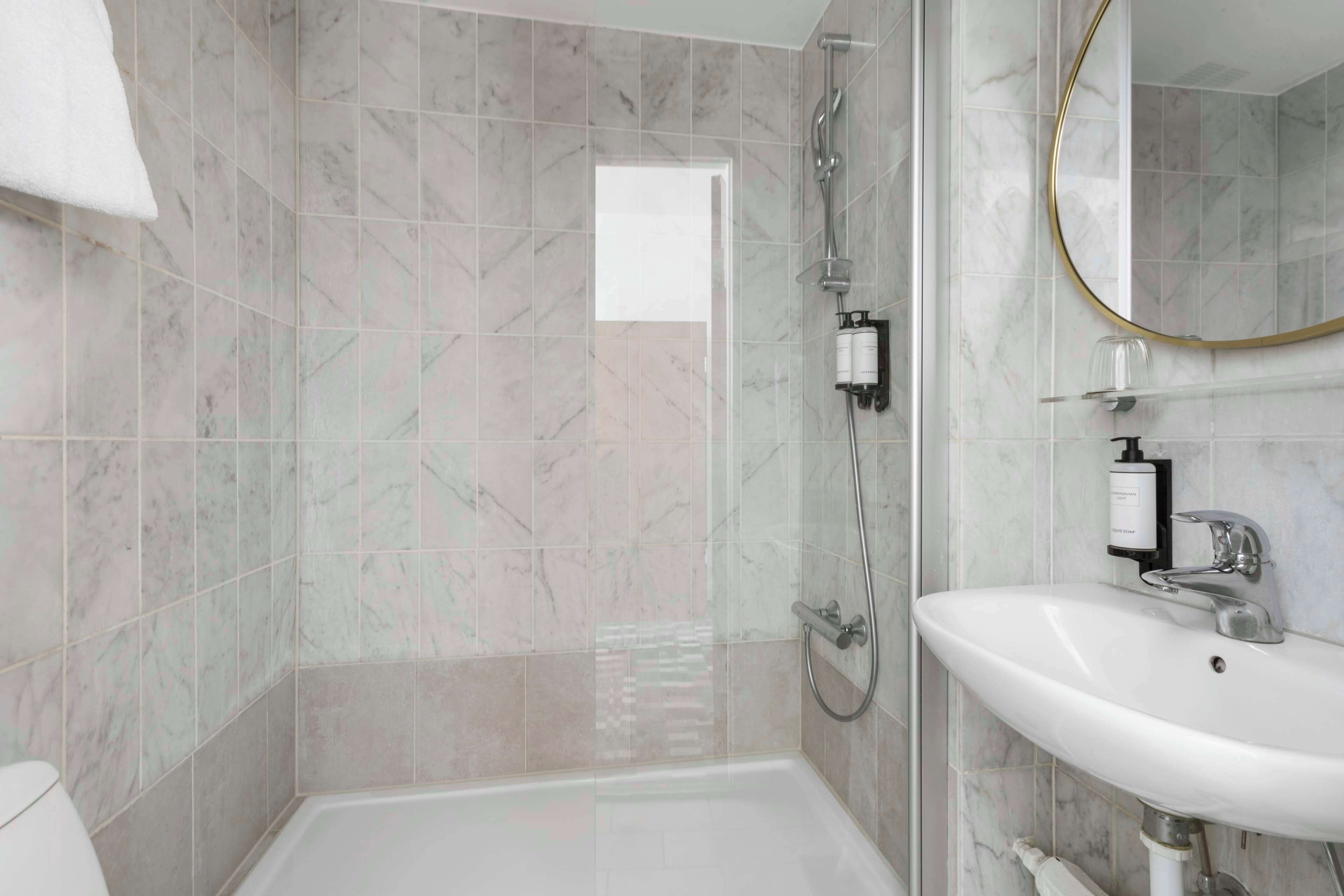 shower, free toiletries, hair dryer, towels