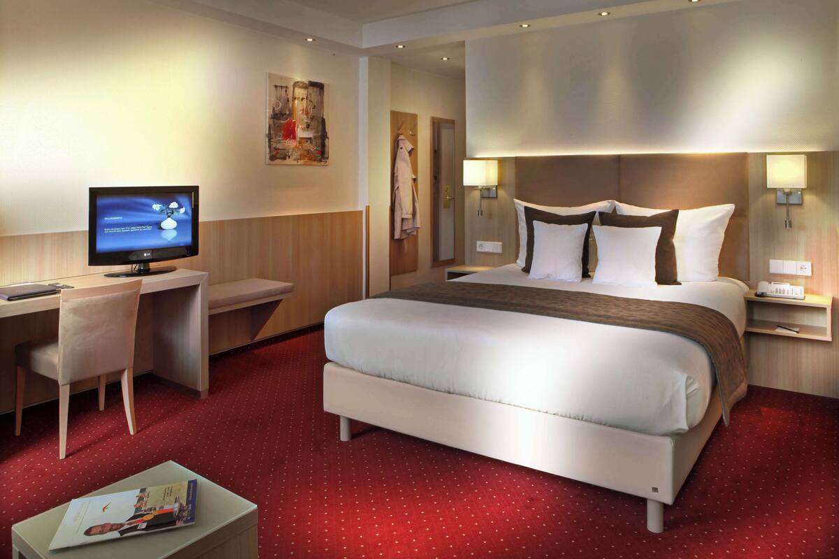 Chambre Affaires, 1 lit double | Literie de qualité supérieure, surmatelas, minibar