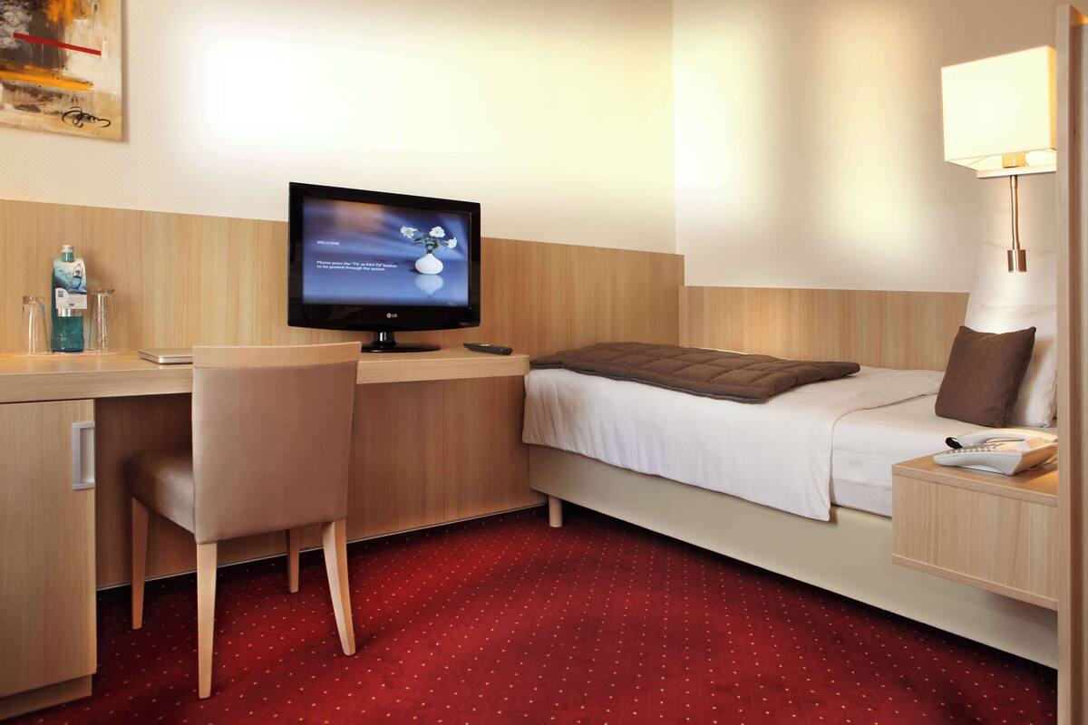 Habitación clásica, 1 cama individual, refrigerador | Ropa de cama de alta calidad, camas con pillow-top y minibar