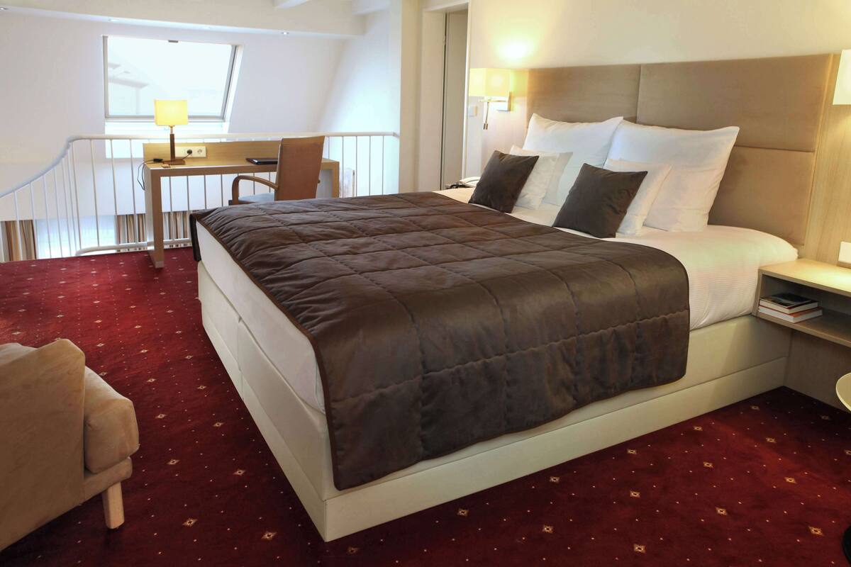 Suite, 1 cama matrimonial | Ropa de cama de alta calidad, camas con pillow-top y minibar
