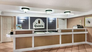 A reception desk with a sign reading "La Quinta." - La Quinta Inn by Wyndham Albuquerque Northeast (Albuquerque)