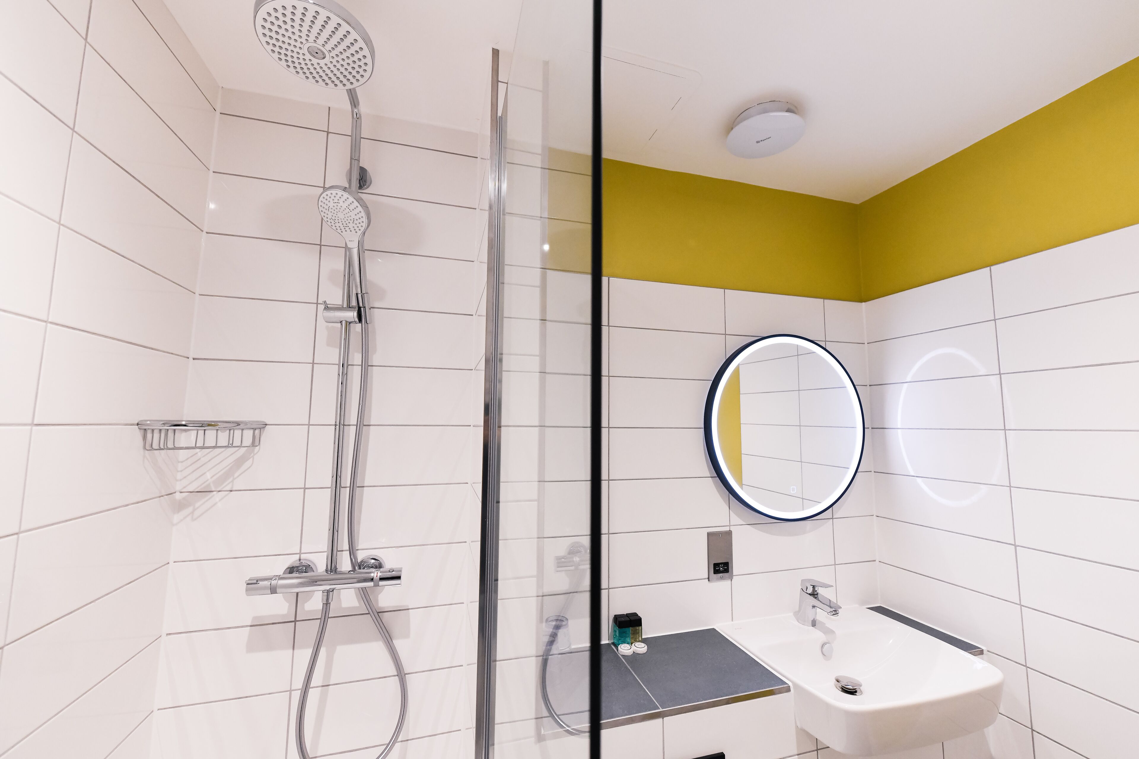 twin room | bathroom | shower, rainfall showerhead, free toiletries, hair dryer