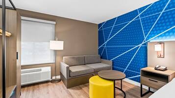 Suite, 1 King Bed, Non Smoking | Desk, blackout curtains, iron/ironing board, free cots/infant beds