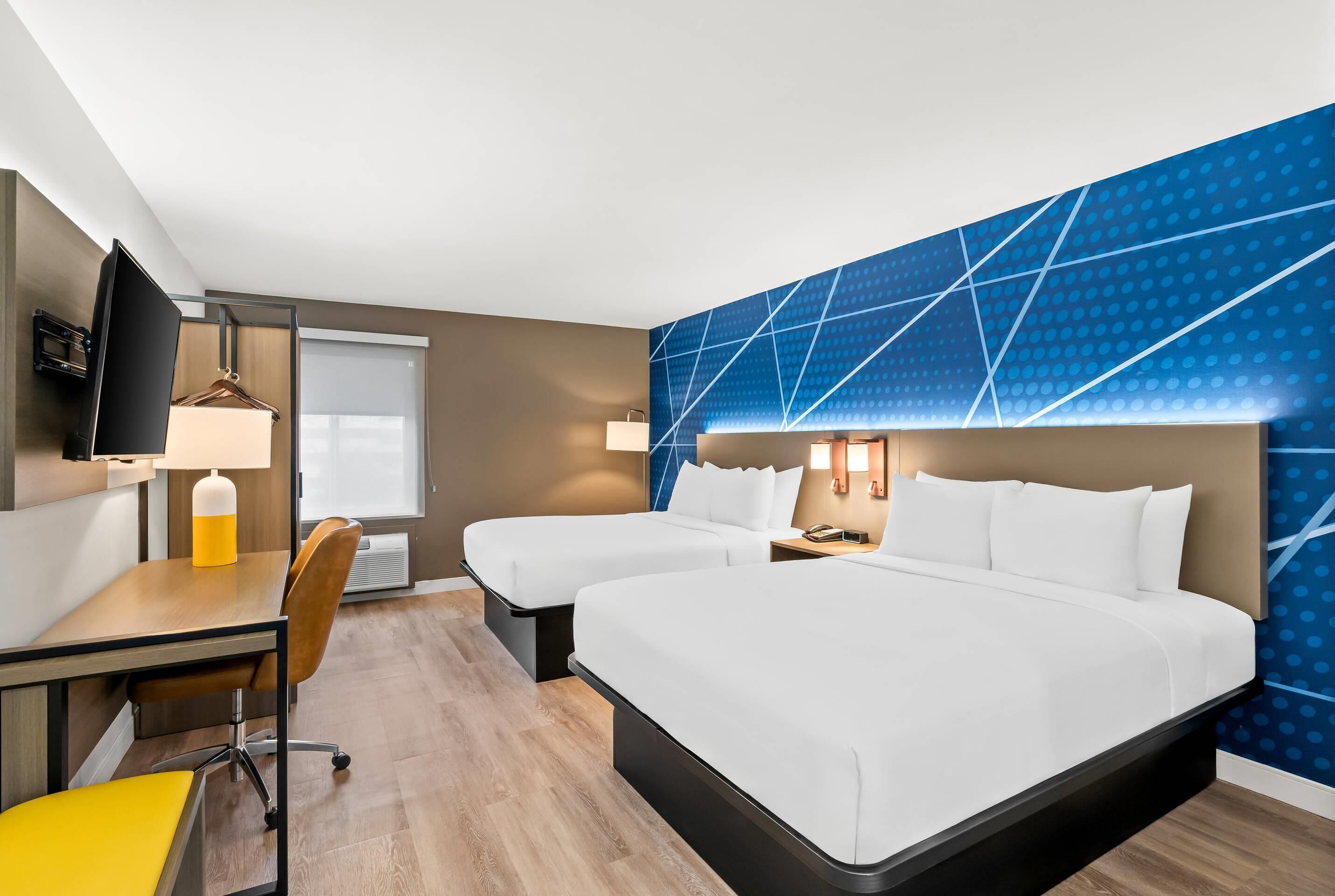 标准房, 2 张大床, 无烟房 | 办公桌、遮光窗帘、熨斗/熨衣板、免费婴儿床