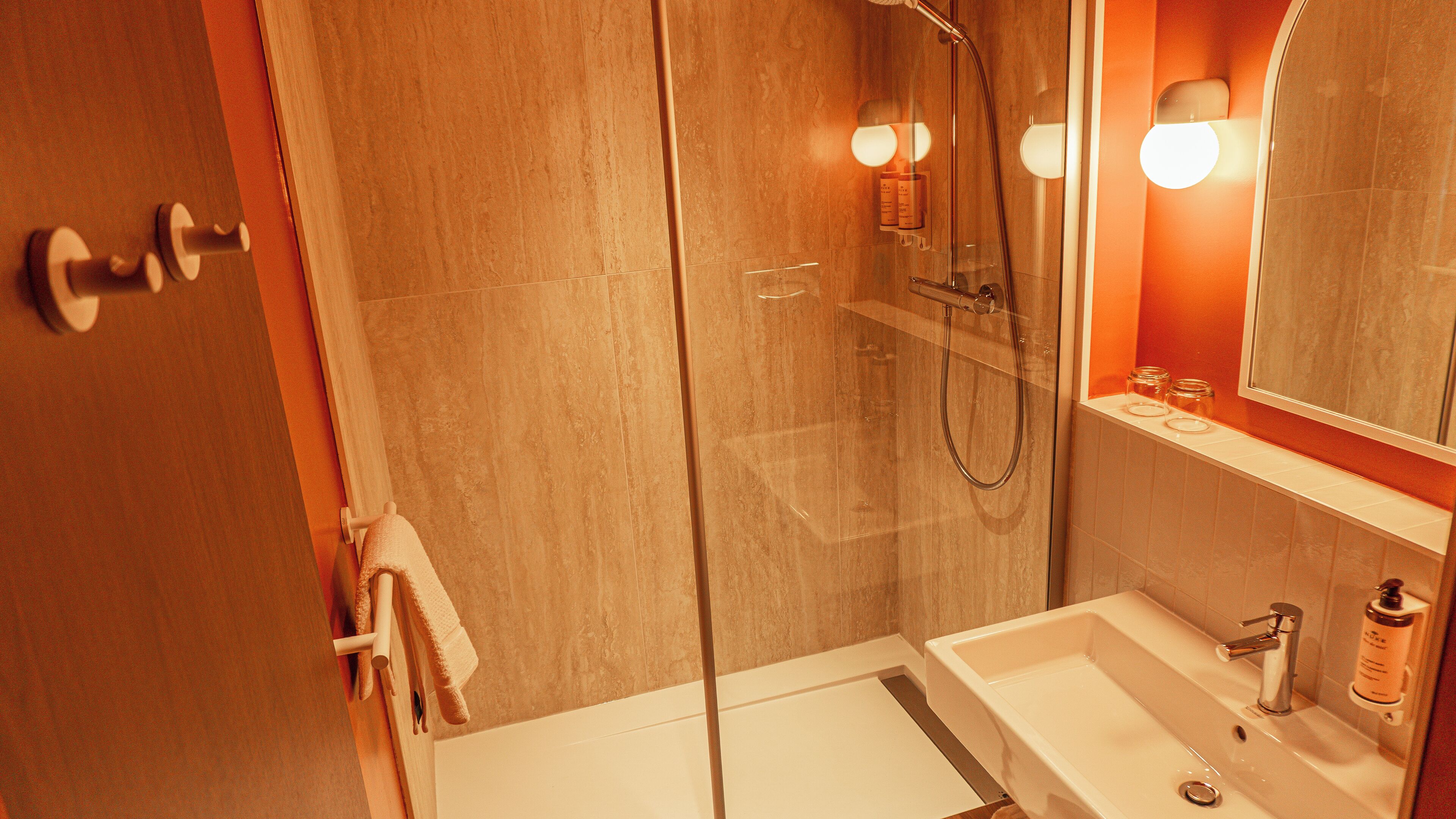 bathtub, hair dryer, towels