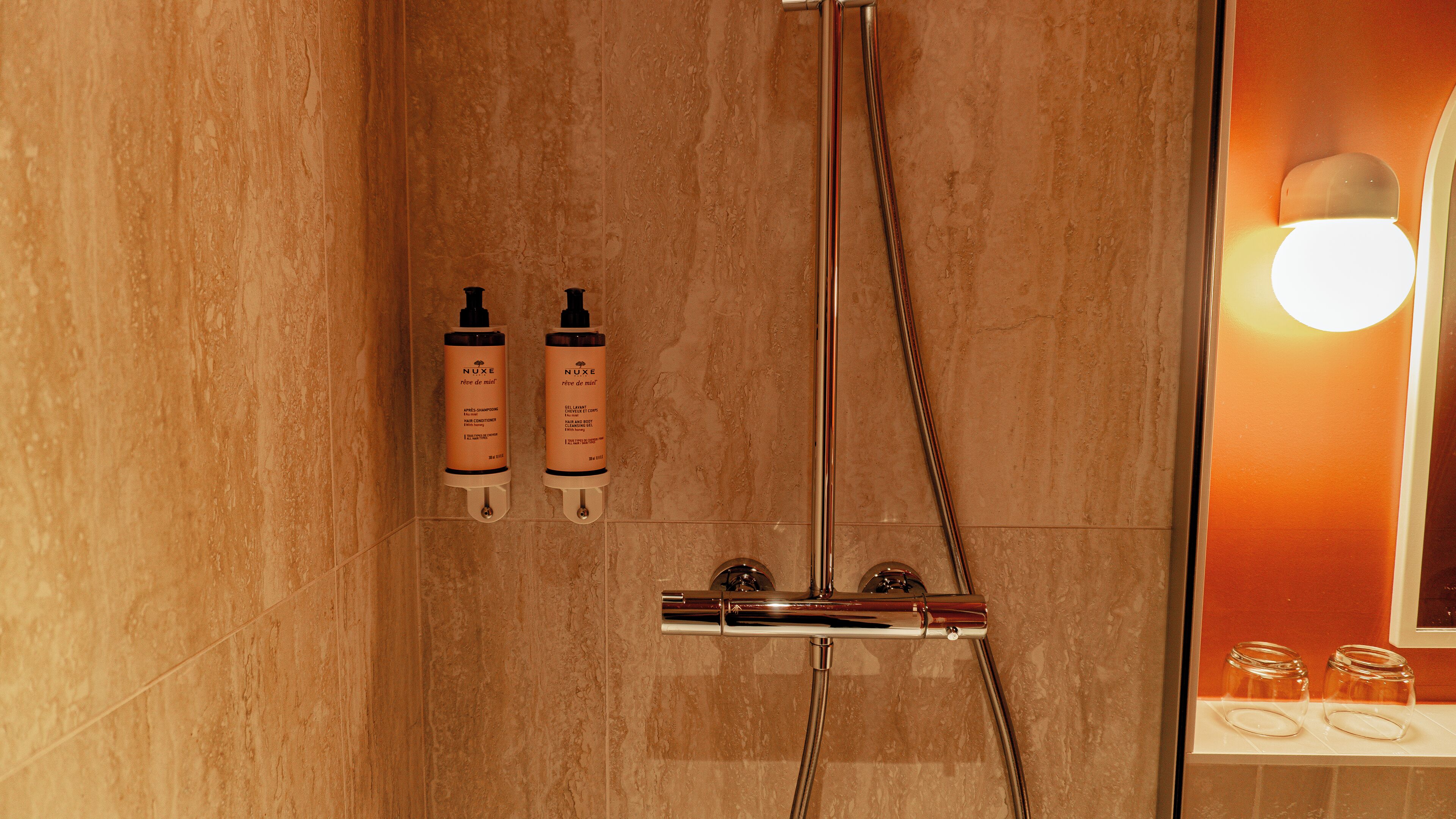 bathtub, hair dryer, towels