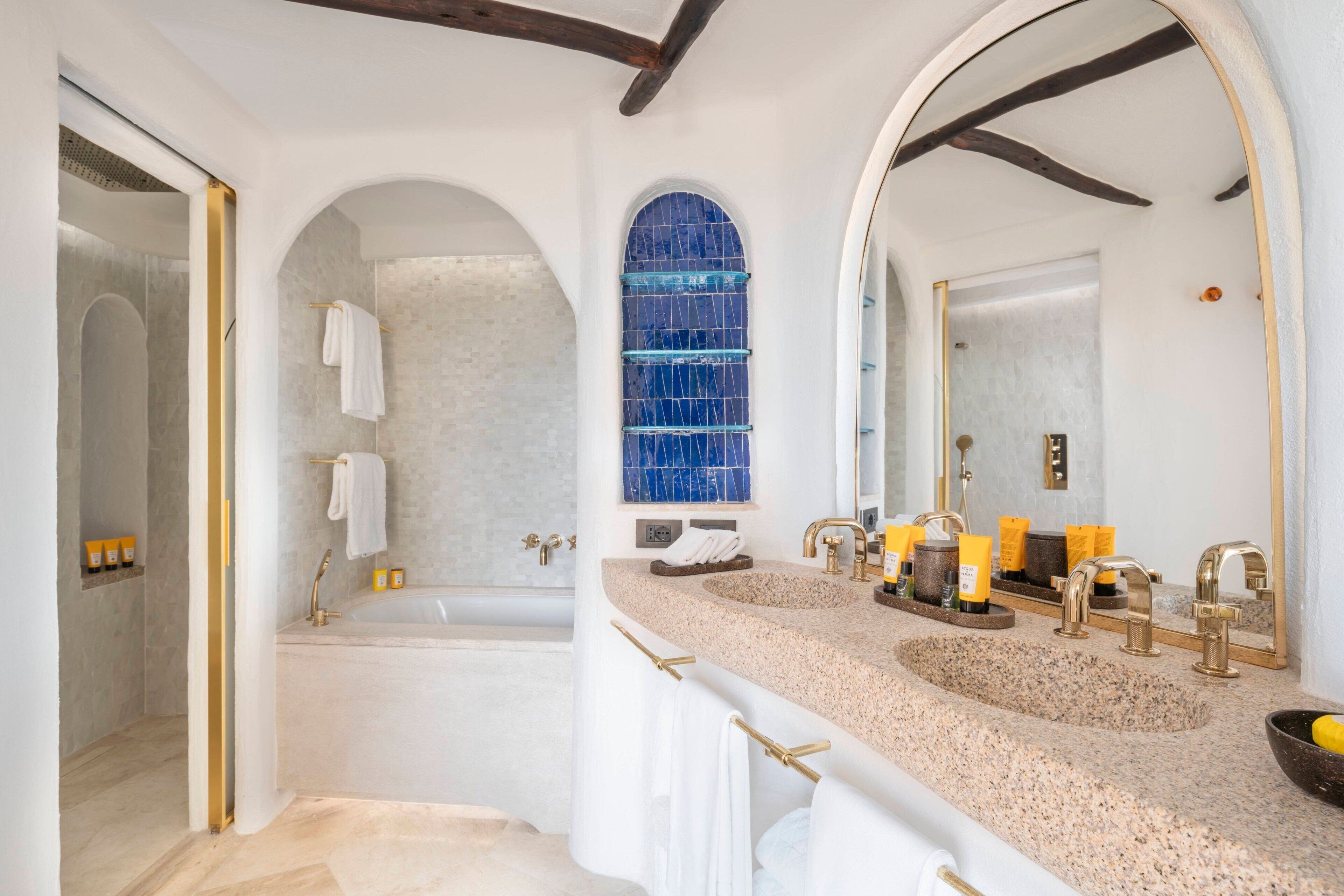 premium suite, 1 king bed, partial sea view (contemporary) | 1 bedroom, frette italian sheets, premium bedding, minibar