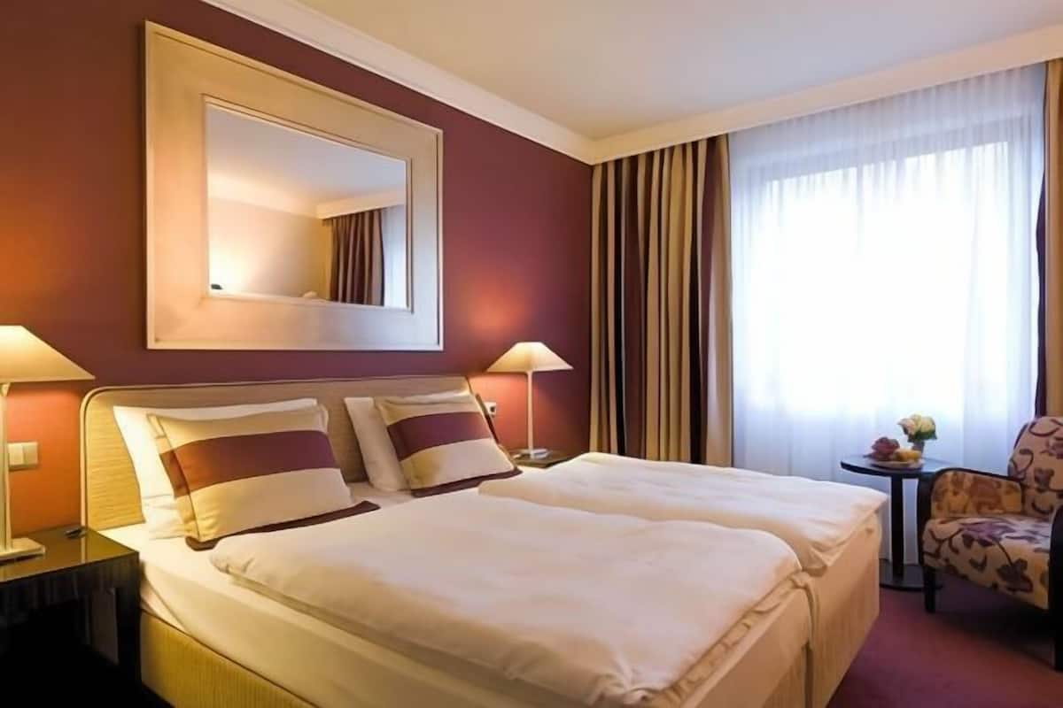Hypoallergeen beddengoed, een bureau, een laptopwerkplek
